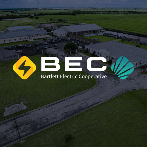 BEC logo overlayed a blue background and an aerial shot of the office