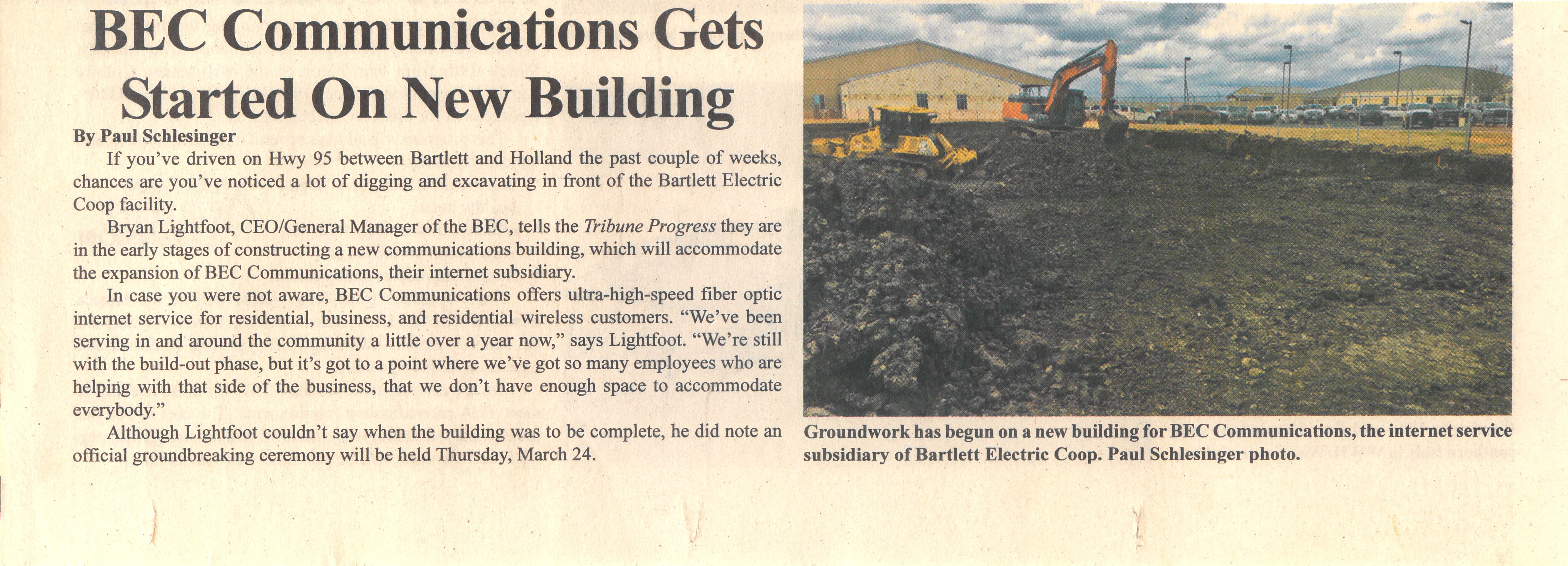 Newspaper clipping with headline ‘BEC Communications Gets Started On New Building’ showing construction equipment for new broadband facility