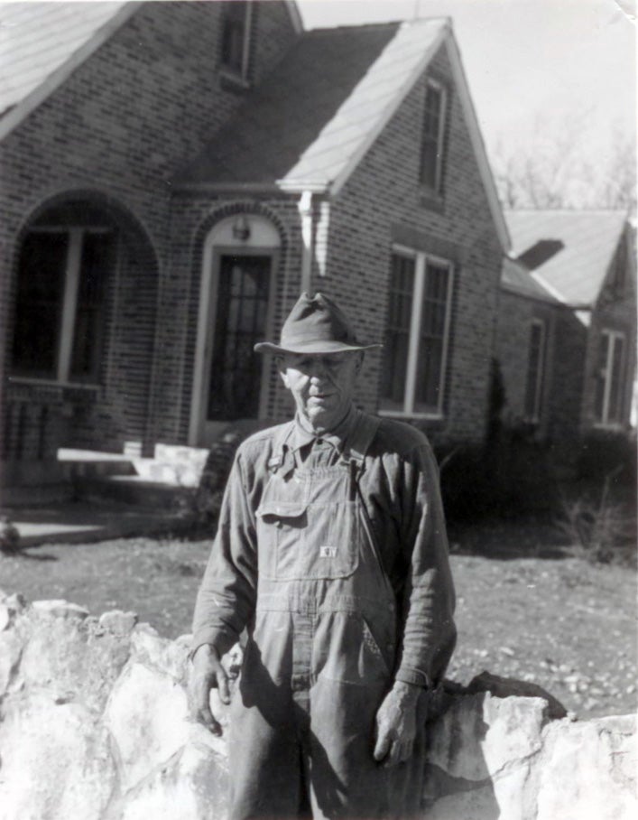 Historic photo of E.M. Steglich, vice president of Bartlett Electric Cooperative, during early rural electrification efforts in Texas
